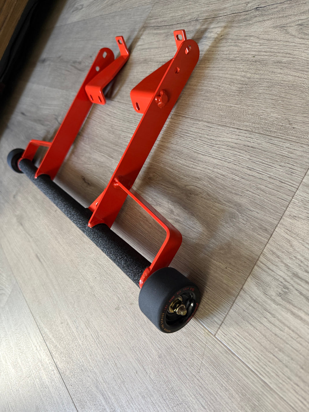 Orange Raptor 700  grab bar with wheels